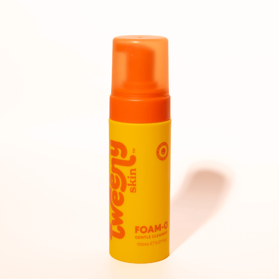Tweeny Skin FOAM-O Gentle Cleanser bottle in bright yellow and orange, displayed against a clean white background.