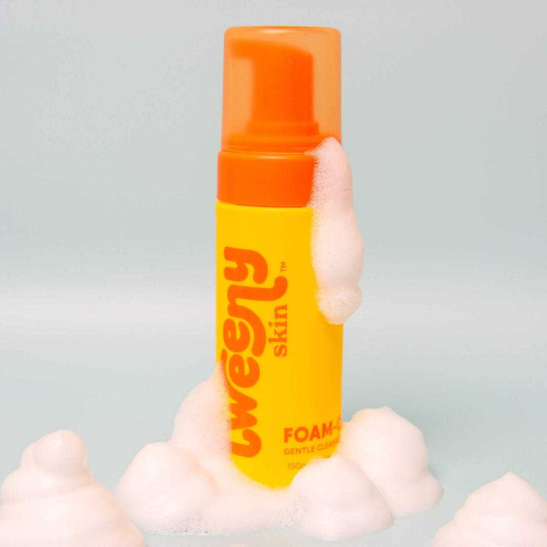 FOAM-O Gentle Cleanser for tweens and teens with foamy lather on light blue grey background | Tweeny Skin Australia