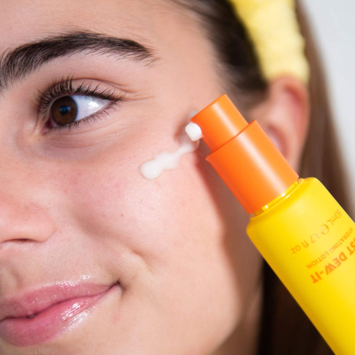 Teen applying Just Dew-It Hydrating Lotion to cheek, gentle fragrance-free moisturiser for tween and teen skincare Australia ages 7–15